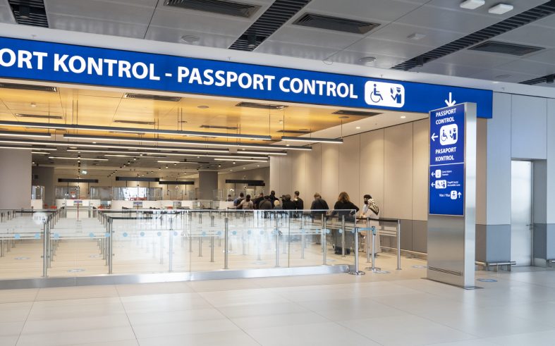 ISTANBUL – OCT 19: Passport control point with officer and passe